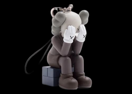 KAWS Passing Through Keychain Brown