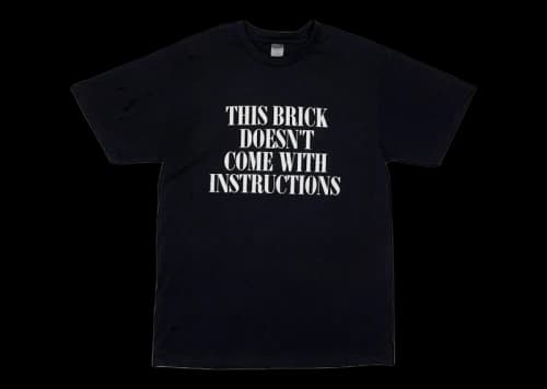 DropX™️ Exclusive: Benny the Butcher x Bricks & Wood x Coachella Instructions Tee Black